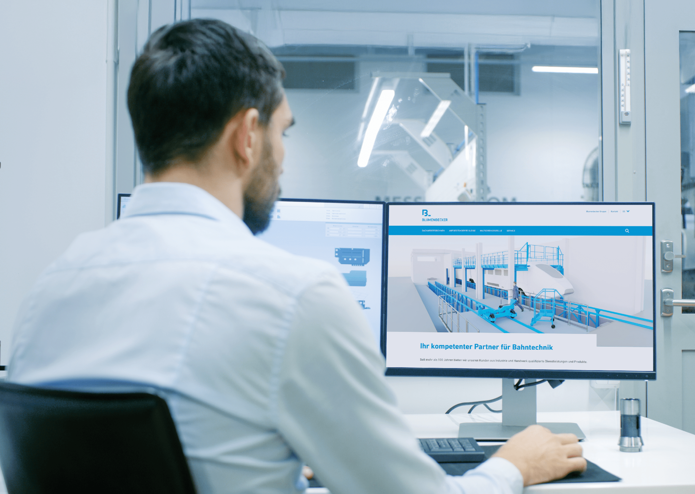 Engineer/ Technician Working on a Personal Computer with Two Displays, One Has a Green Screen Chroma Key Template Great for Mockup. Out of the Office Window Components Manufacturing Factory is Seen.