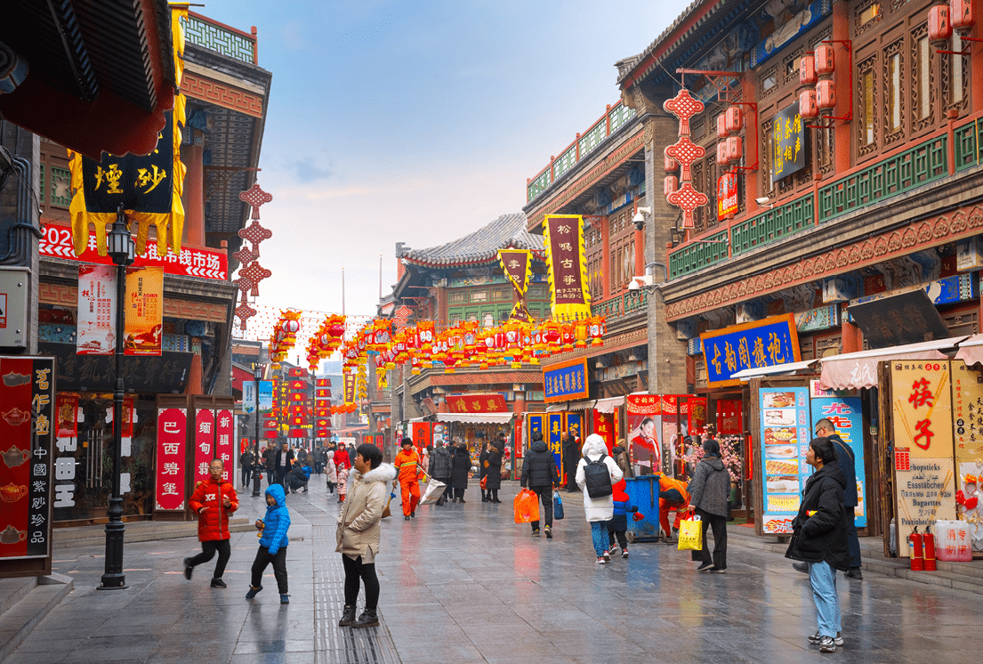 Tianjin, China - Jan 16 2020: Guwenhua Jie is a pedestrian pathway complex with Tian Hou temple, shops, kiosks nad street vendors situated on the west bank of Hai river in Nankai district
